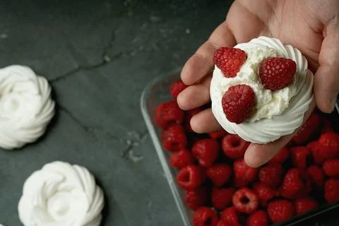 Assembling mini pavlovas Stock Photos