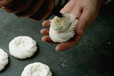 Assembling mini pavlovas Stock Photos