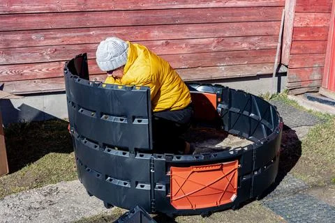 Assembling modular plastic composter factory produced from identical panels.. Stock Photos