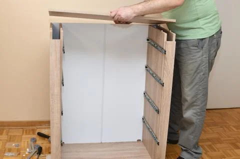 Assembling a New Cabinet Stock Photos