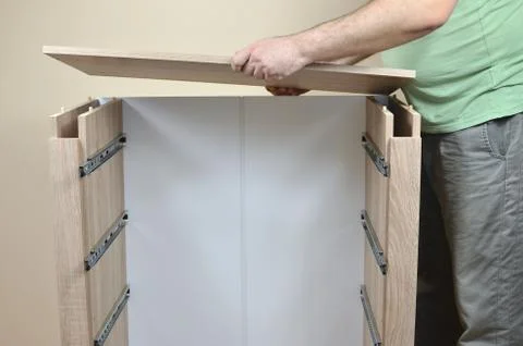 Assembling a New Dresser Stock Photos