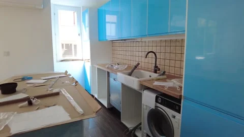 Assembling new kitchen. Kitchen installation in new apartment. Video stock 201193929