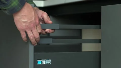 Assembling new modern drawer system with adjustment mechanism Stock Footage 200812927