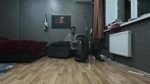 Assembling an office chair at home, work, tools, Russia, Tyumen, 10/28/24, cats Stock Footage 290389728