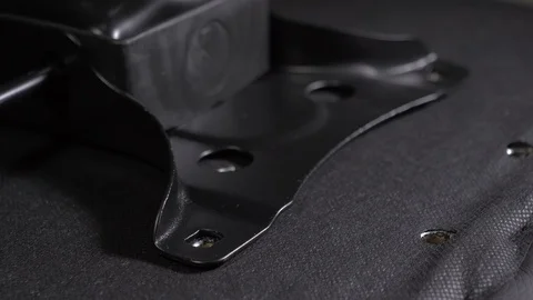 Assembling office chair, screwing in the bolts with imbus key Stock Footage 95284434