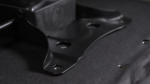 Assembling office chair, screwing in the screw Stock Footage 95284165