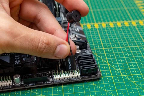 Assembling a personal computer processor connecting speaker in a service. Upg 写真素材