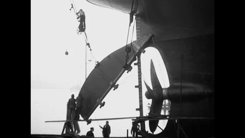 Assembling The Rudder Behind The Propeller At A Shipyard Stock Footage 91461259