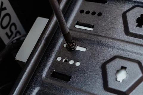 Assembling screwing a personal computer processor in a service. Upgrade repai Stock Photos