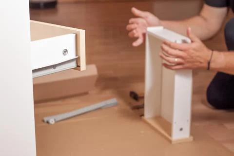 Assembling of table Stock Photos