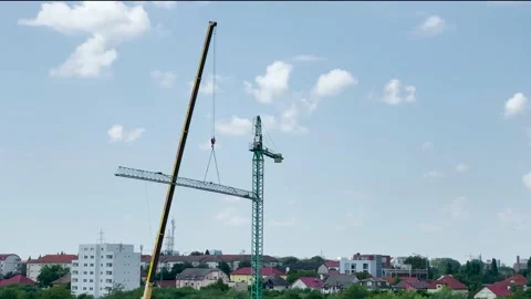 Assembling a tower crane Stock Footage 160931584