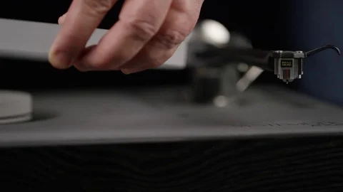 Assembling turn table and placing LP record to play Stock Footage 75295250