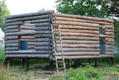 Assembling a wooden frame and building a house. Russia. Texture of old wooden Stock Photos