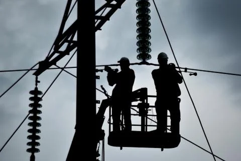 Assembly and installation of new support of a power line Stock Photos