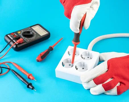 Assembly of a block of four electrical outlets Stock Photos