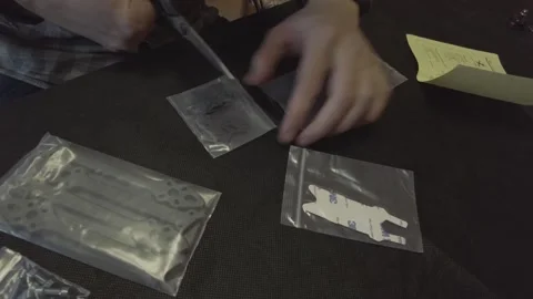 Assembly of carbon frame for FPV quadcopter, 5 inches Stock Footage 168340948