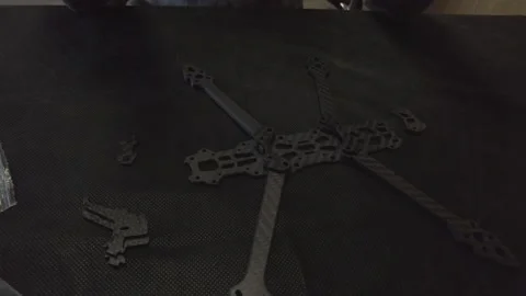 Assembly of carbon frame for FPV quadcopter, 5 inches Stock Footage 168341469