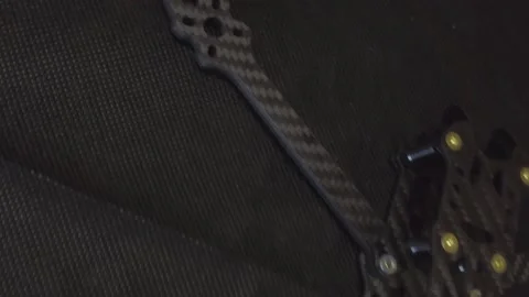 Assembly of carbon frame for FPV quadcopter, 5 inches Stock Footage 168342047