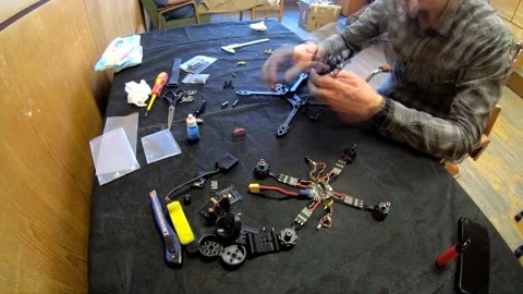 Assembly of carbon frame for FPV quadcopter, 5 inches Stock Footage 168348367