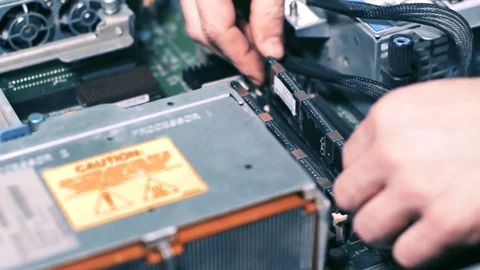 The Assembly of the computer. The engineer collects the server Stock Footage 82423288