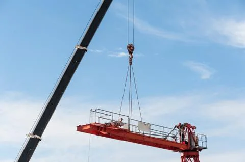 Assembly of a construction crane. Stock Photos