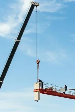 Assembly of a construction crane. Stock Photos