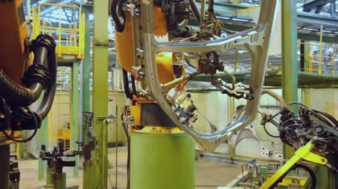 Assembly conveyor with robotics which weld car parts at factory Stock-Footage 24814514