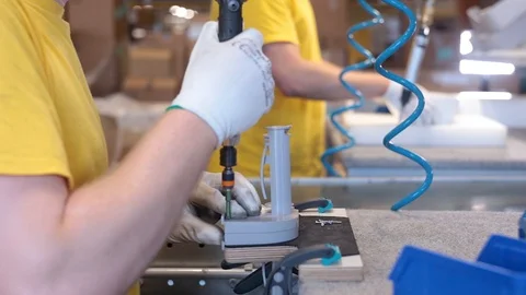 Assembly with Electric Screwdriver Stock Footage 101348646