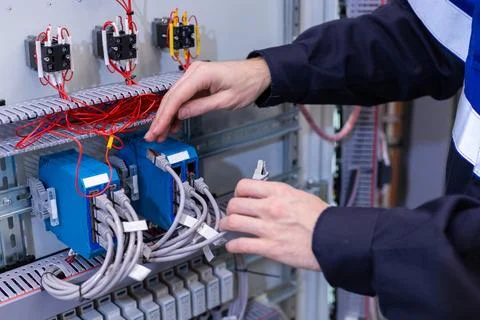 Assembly of electrical cabinet components, installation of components in pr.. Stock Photos