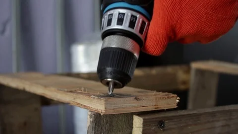 Assembly of the frame for sending fragile cargo, tightening screws Stock Footage 112350688