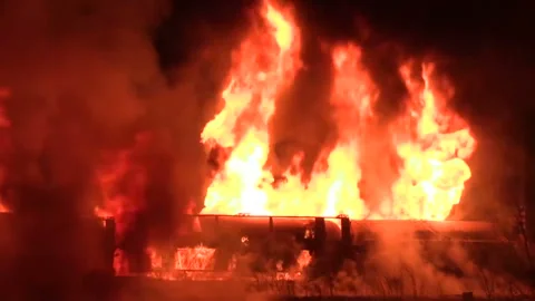 The Assembly frames the fire in the night train Stock Footage 90511276