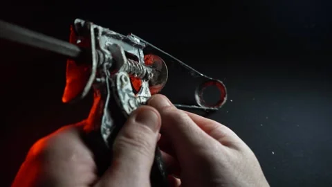 Assembly gun for sealants for construction work in red light Vídeo Stock 302340529