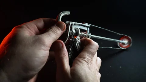 Assembly gun for sealants for construction work in red light 動画素材 302340583