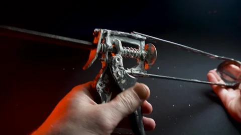 Assembly gun for sealants for construction work in red light Vídeo Stock 302340591