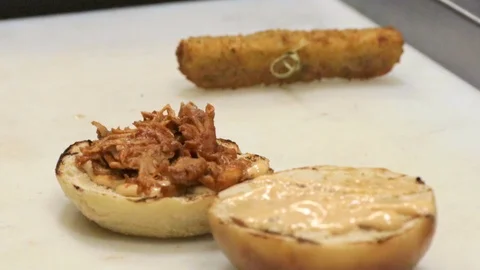 Assembly of an hamburger Stock Footage 109390117