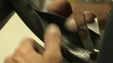 Assembly of a leather steering wheel Stock Footage 22413852