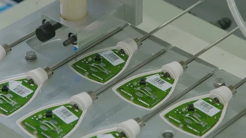 Assembly line of electronic equipments in a large industrial plant. PCB Stock Footage 86798657