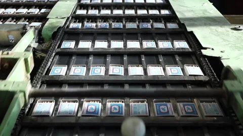 Assembly line for matchboxes at a match factory Stock Footage 304132749