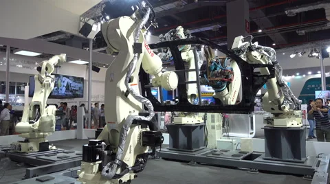 Assembly line production robot on display at trade show Shanghai, China Stock Footage 61827589