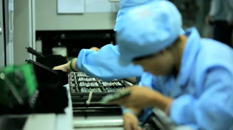 Assembly line technology Chinese worker producing PCBs, China Video stock 33528551
