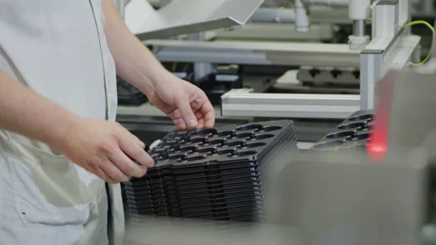Assembly line work in High Tech Production Plant - female worker in Factory Stock Footage 167131762