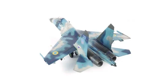 Assembly Model of Su-27 Fighter Airplane on White Background. Stock Footage 295454173