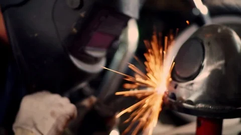 Assembly of the motorcycle. welder Stock Footage 77727769