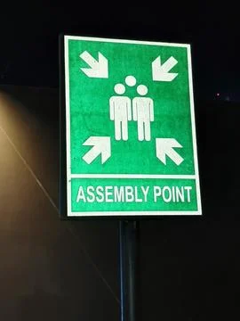 Assembly point sign when a disaster occurs Stock Photos