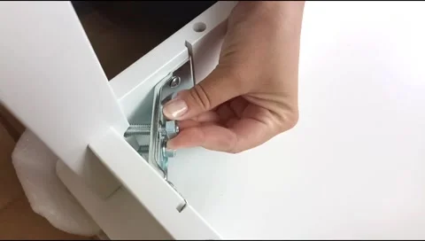 Assembly of table frame by attaching table leg with metal brackets,bolts and nut Stock Footage 339178408