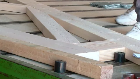 Assembly of wooden structures of a panel house at a woodworking plant Stock-Footage 299895853