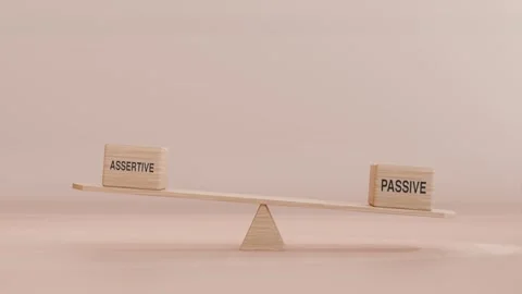 ASSERTIVE AND PASSIVE BALANCING ON SEESAW 스톡 동영상 294675751