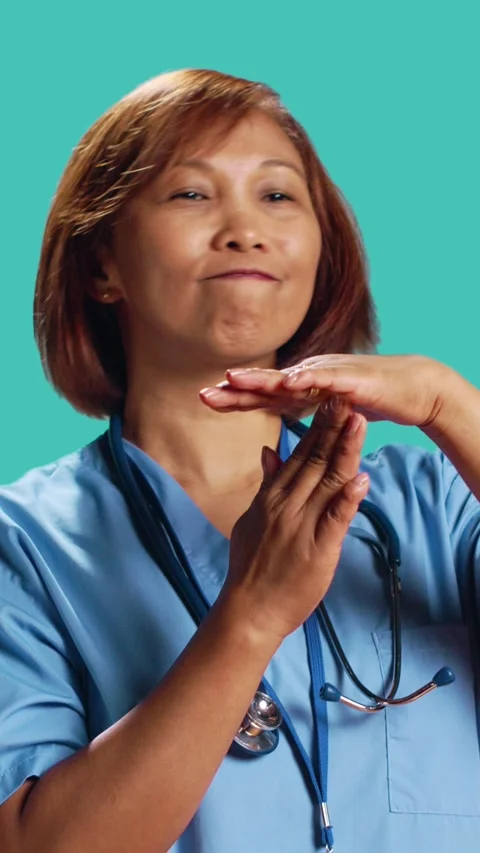 Assertive asian nurse asking for timeout Video stock 244646158