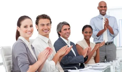 Assertive business people clapping a good presentation Stock Photos
