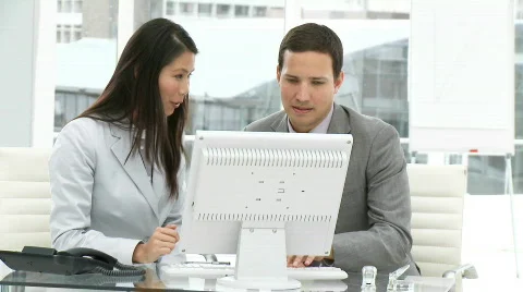 Assertive business team working at a computer Stock Footage 626163